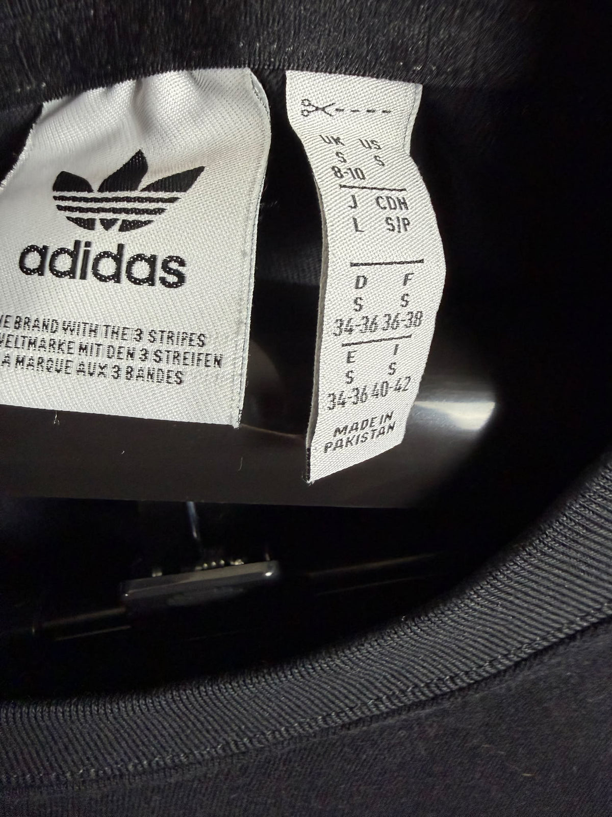 black adidas 4.0 Stretch Logo Short-Sleeve Tee featuring a collegiate purple trefoil logo(S)